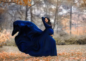 Schwangerschaftsbild draussen Kleid